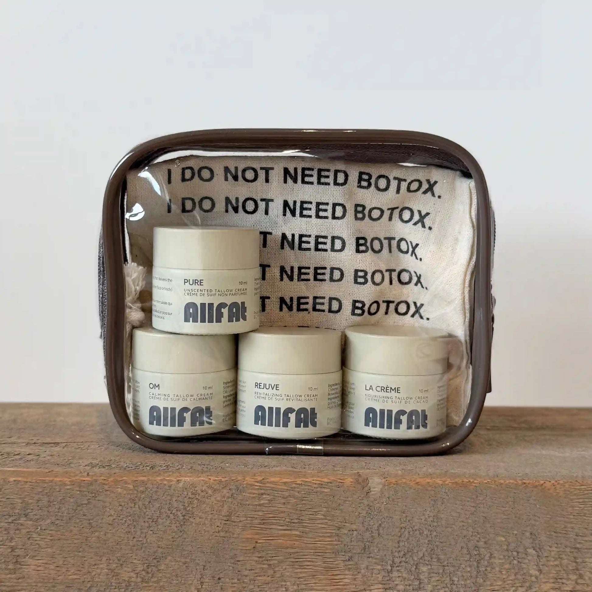 allfat small sample jars of tallow cream in a plastic pouch with a i do not need botox bag in the background.